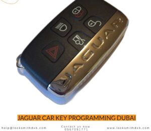Jaguar car key fob and programming equipment in Dubai locksmith workshop